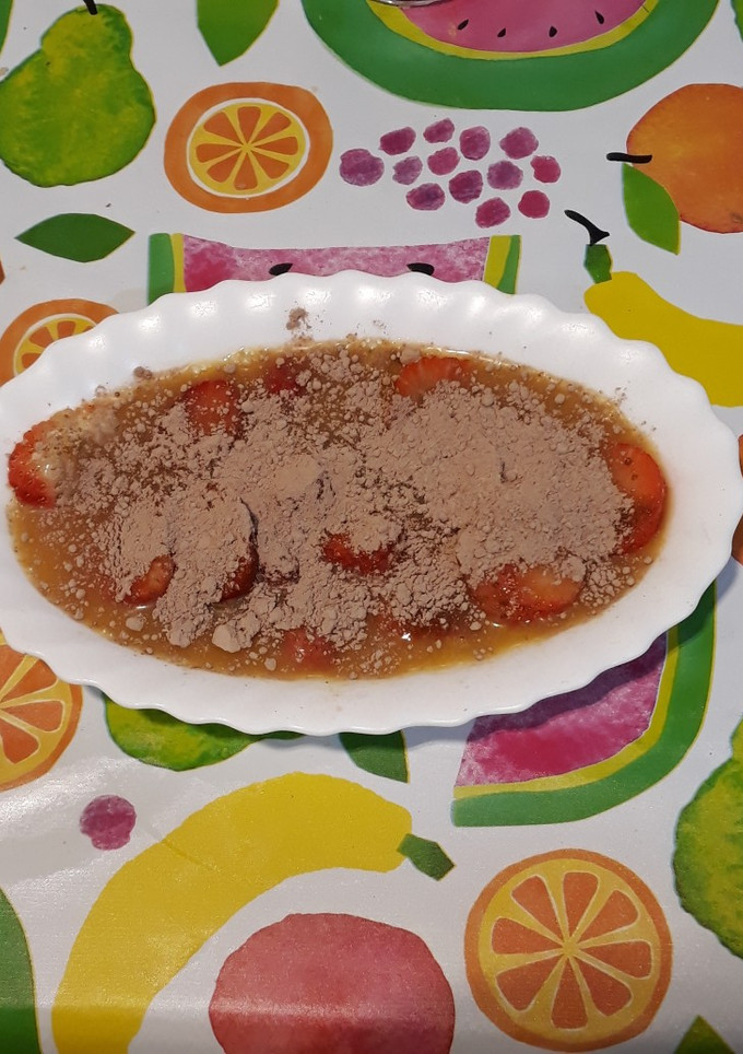 Una foto de Fresas con zumo de naranja y colacao
