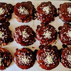 A picture of Tripe chocolate raspberry muffins 🍫.