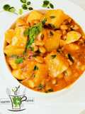 Yam and beans porridge with moringa