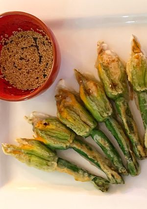 A picture of Squash blossoms (Stuffed with tofu and sesame filling).