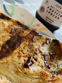 Una foto de Crepes de avena sabor galleta y crema con nutella fit🤩