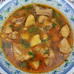 A picture of Aalu chicken ka salan.