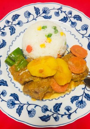 A picture of Pork Loin Marinated in White Wine with Potatoes, Carrots, and Green Peppers!.