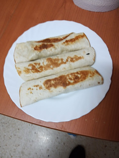 Una foto de Burritos de lomo, pimiento y queso
