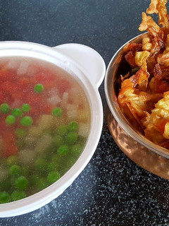A picture of Vegetarian clear soup and fritter.