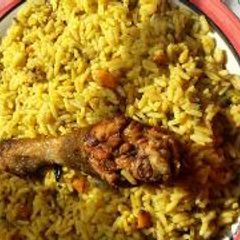 A picture of Fried rice and chicken.