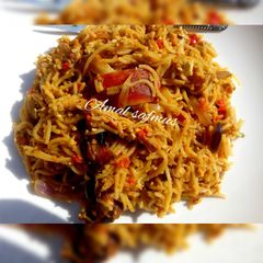 A picture of Spaghetti with scramble egg.
