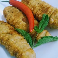 A picture of Wrapped chillies samosas.