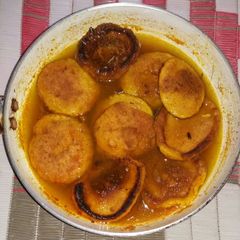 A picture of Gram flour pakora curry.