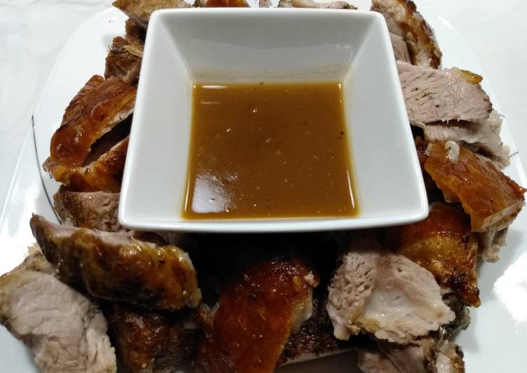 Pork roast with crispy crackling and apple gravy