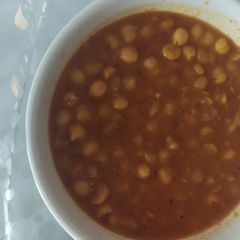 A picture of White beans with gravy.