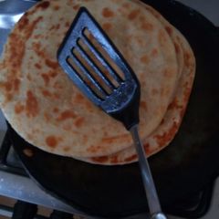 A picture of Golden Layered Chapati.