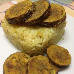 A picture of Crispy Baigan Bhaja with Mango Rice.