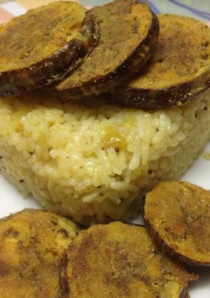 A picture of Crispy Baigan Bhaja with Mango Rice.