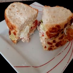 A picture of My Tigerbread Sandwich fresh chicken, tomatoes sliced, + more 😘.