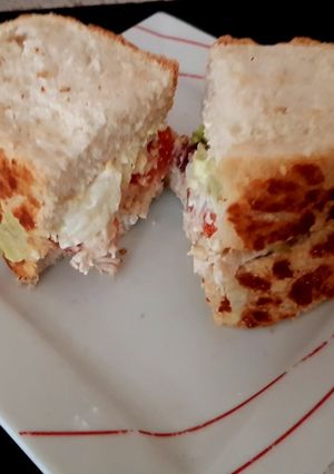 A picture of My Tigerbread Sandwich fresh chicken, tomatoes sliced, + more 😘.