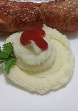 A picture of Chicken Roulade with Mashed Potatoes.