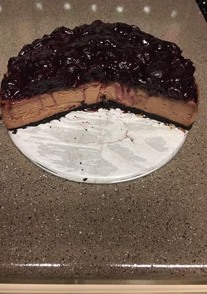 A picture of Gregtsters Chocolate Cheesecake with Black-cherry Glaze & Oreo cookie infused with coffee crust!!!!!.