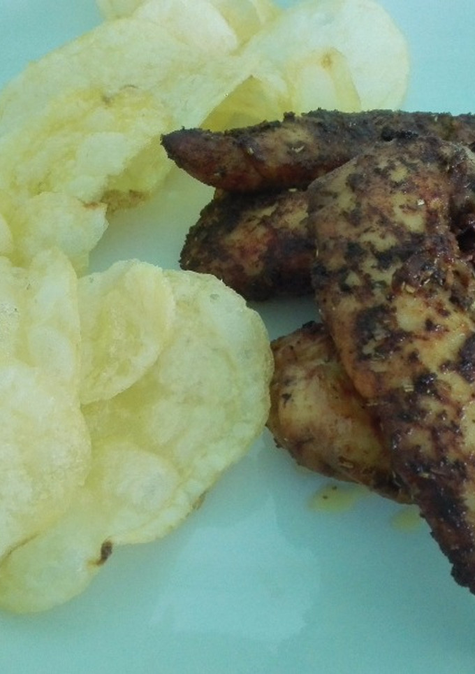 Una foto de Pollo adobado a mi estilo
