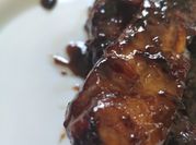 Una foto de costilla de cerdo en coca cola