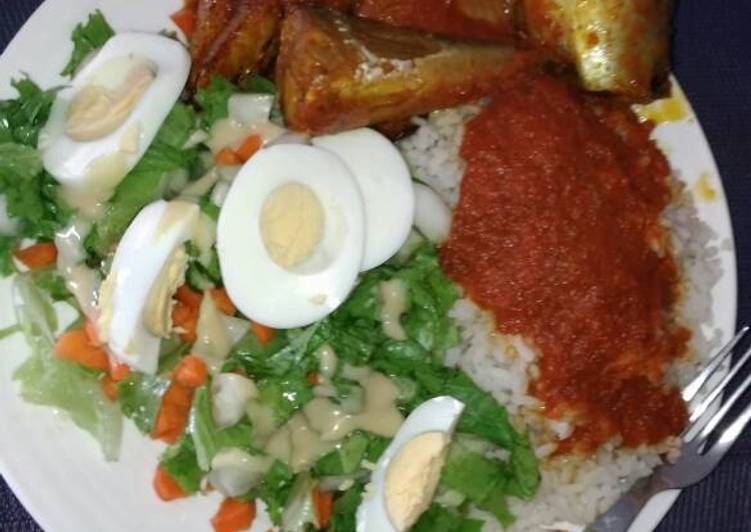 White rice with stew,Titus fish and salad