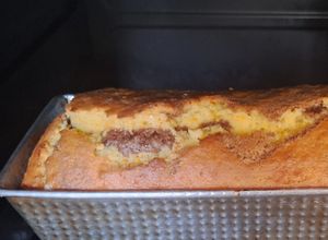 Una foto de Budín marmolado XL kinotos y cacao (en licuadora)