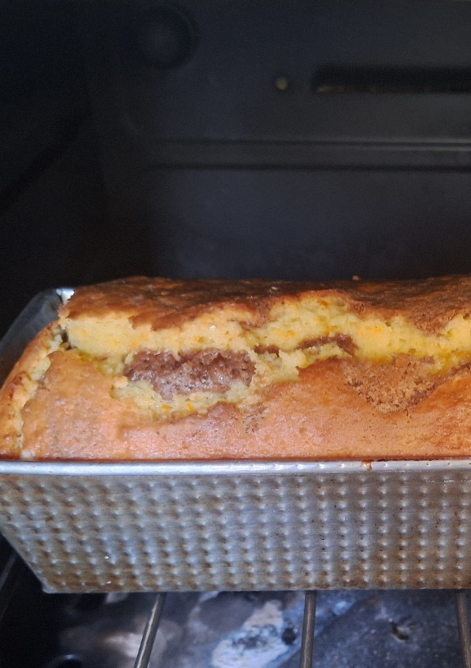 Una foto de Budín marmolado XL kinotos y cacao (en licuadora)