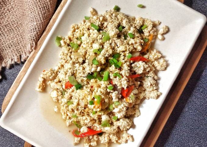 Bagaimana Menyiapkan Orak Arik Tahu Bumbu Simpel, Lezat