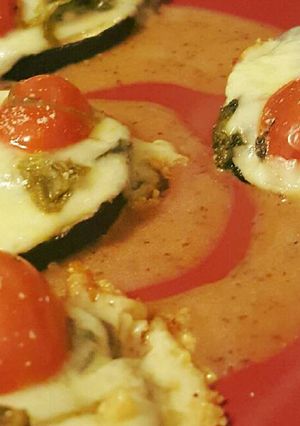 A picture of Cheesy tomato and basil eggplant.
