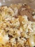 Carne con arroz en la planchetta