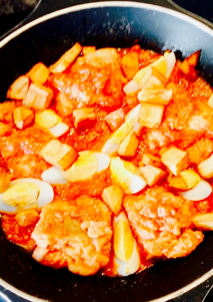 Una foto de Bacalao con tomate