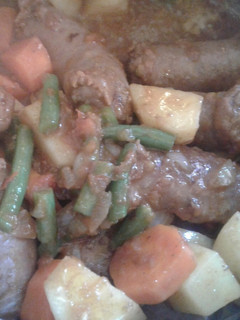 A picture of Wors in steamed veggies.