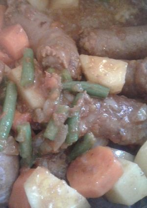 A picture of Wors in steamed veggies.