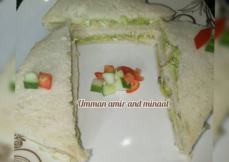 Avocado fish and egg sandwich