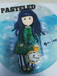 Una foto de Pastel de naranja y chocolate con fondant