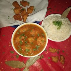 A picture of Assamese bilahi boror tenga (Sour Curry with Red Lentil Fritter).
