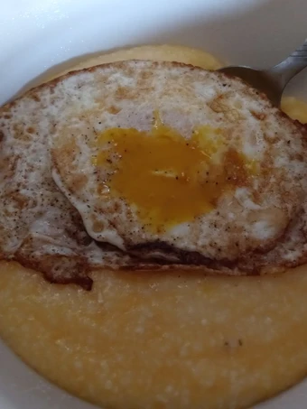 Easy Steps to Make Recipes Cheddar Grits with a Dippy Egg the Can Spoil the Tongue Perfect.