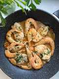 Wok de langostinos con rape