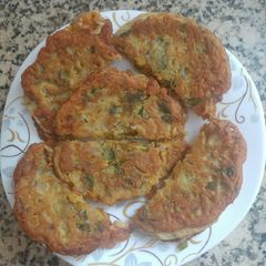 A picture of Cheesy besan kulcha.