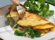 A picture of eggs tortillas and avocado