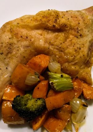 A picture of Super-moist roast chicken with yams and broccoli.