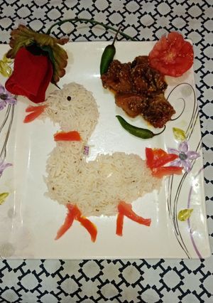 A picture of Aloo baigan ki sabzi with zeera rice.
