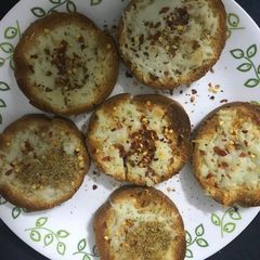 A picture of Garlic cheesy bread.