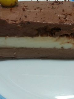 Una foto de Tarta de tres chocolates