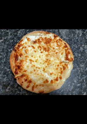 Une photo de Pizza quatre fromages maison