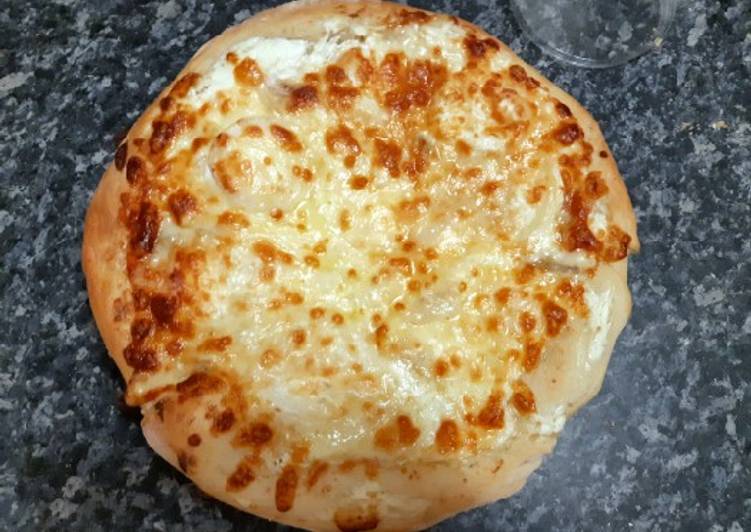 La Délicieuse Recette du Pizza quatre fromages maison