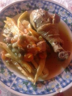 Una foto de Pollo arvejado