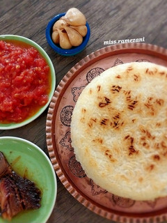 عکسی از دستور پامادور خورش با ماهی دودی