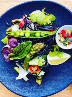 A picture of Lemon and Lime Charcoal Noodles with Green Herbs and Veggies 🌱.