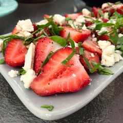 A picture of Strawberries with Blue Cheese, Arugula & Balsamic.